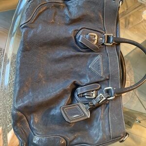 Authentic Prada leather bag. Well loved but lots more to give. Needs good home💕